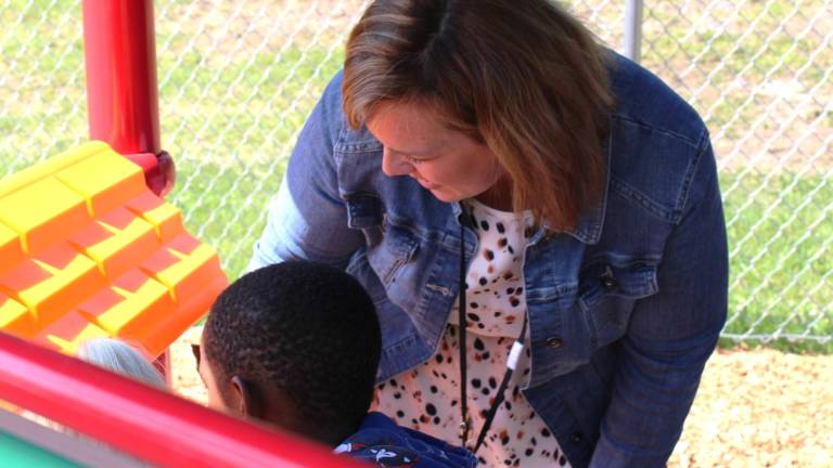 Principal Starla Ciarelli with a Golden Hill Elementary School student.