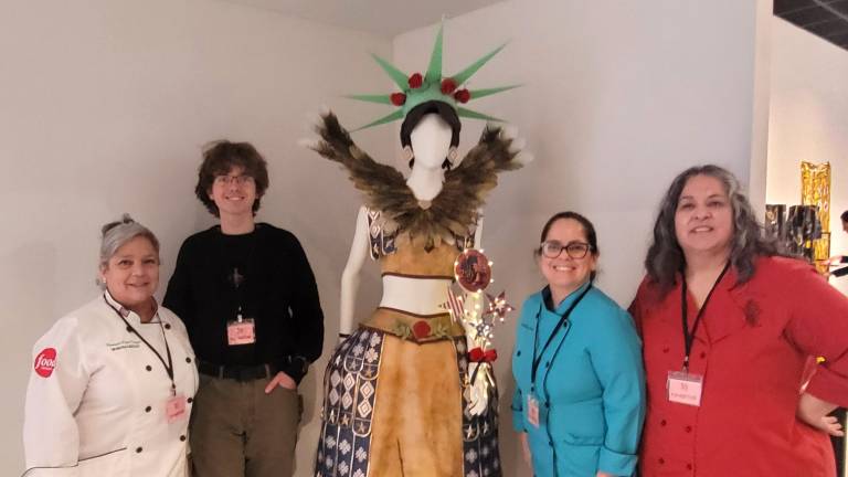 Chef Vanessa Greeley (from left) &amp; her team - designer Finbar O’Connor, a senior at Warwick Valley H.S., &amp; sugar and cake Aatists, Carolina Lara and Silvina Barboza, created an edible dress that debuted on March 8 and 9 at the Salon du Chocolat Fashion Showcase in Manhattan.