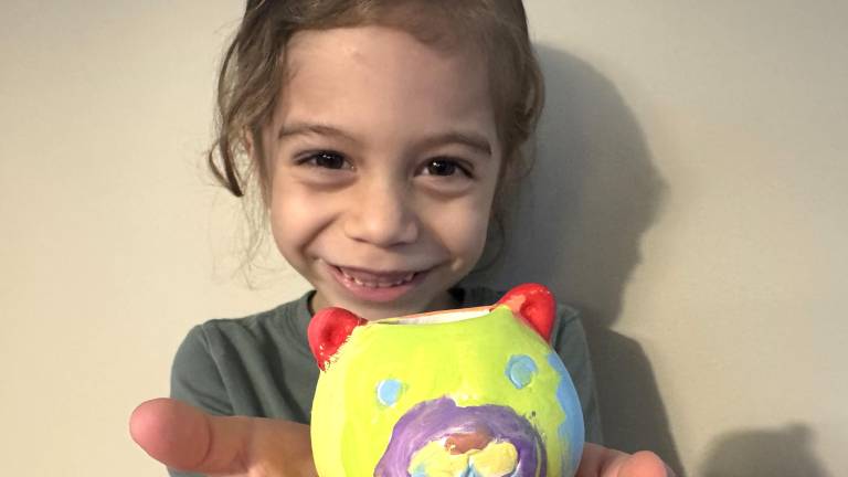 For younger attendees, the Kids’ Art Activity Center offers a hands-on experience where children can paint their own ceramic animal pots and plant flower seeds to take home.