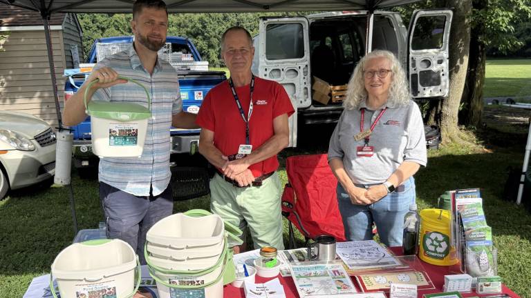 Pictured from left to right at Saturday’s Lakeside Farmers Market in Greenwood Lake are: Ermin Siljkovic, Orange County Recycling Coordinator and Jim Hall and Kirsten McCormick, both Master Gardeners with Cornell University Cooperative Agricultural Extension. Photo by Peter Lyons Hall.