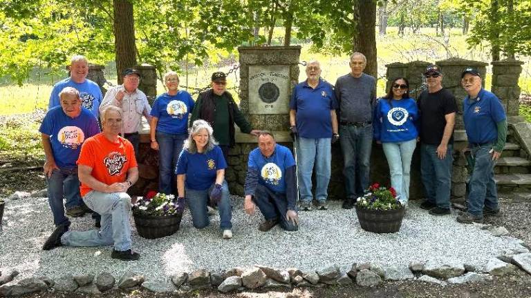 Rotary volunteers who helped clean up Warwick Cemetery included, left to right, front row, Stan Martin, Leo R. Kaytes, Tina Buck and John McGloin; back row, Bob Carl, Ed Wiley, Maria Codd-Perez, Tony Cosimano, Mike Eckert, Al Hauser, Melissa Colon, Neil Sinclair and Doug Stage.