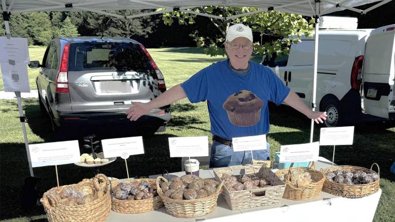Muffin Man Bill Scher and his gluten-free muffins at the Lakeside Farmers Market.