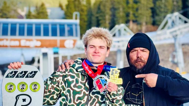 Max Fox Rabdau at the 2026 USASA National Championships in Copper Mountain, CO with his coach Will Rivera of Syndicate Worldwide Coaching.