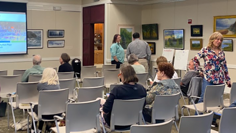 Community members learn about transportation safety plans at village of Warwick meeting.