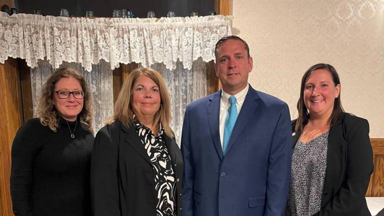 Orange County Deputy Budget Director Gretchen Riordan, Budget Director Deb Slesinski, County Executive Steven Neuhaus and Commissioner of Finance Kerry Gallagher at the Sept. 26 meeting of the Orange County Association of Towns, Villages and Cities at the Erie Hotel and Restaurant in Port Jervis.