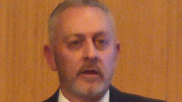 OCIDA CEO Bill Fioravante addresses crowd at meeting on brownfield remediation.