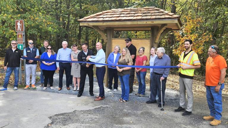 The ribbon for the two-mile trail connecting Hickory Hills Golf Course with a newly constructed parking area on Cascade road was cut on Sept. 29, 2025.