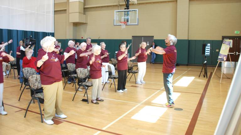 David Dworkin leads a Conductorcise class.