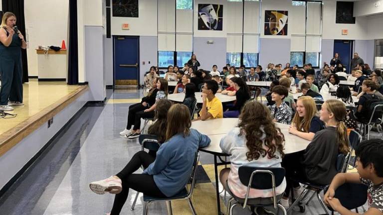 Kaila Mullady performs for Florida students.