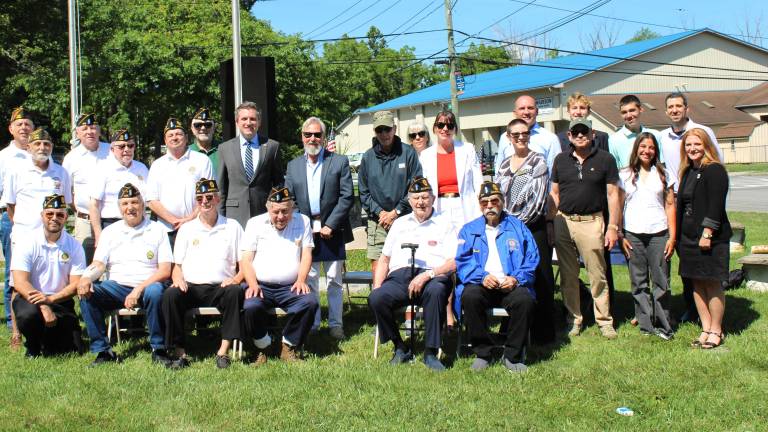 Local leaders, student researchers, veterans and residents gather at the site of Patriot’s Path in Warwick.