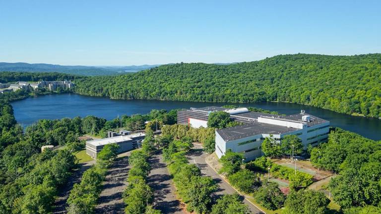 Office buildings in the foreground sit on Jehovah’s Witnesses recently acquired property in Warwick. The group’s world headquarters can be seen on the far left.
