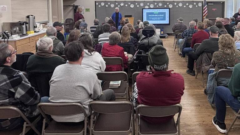 Greenwood Lake residents packed the library on Feb. 15 to learn about the history of its main street, Windermere Avenue, as researched and described by local Zoey Savale. Photo by Peter Lyons Hall.